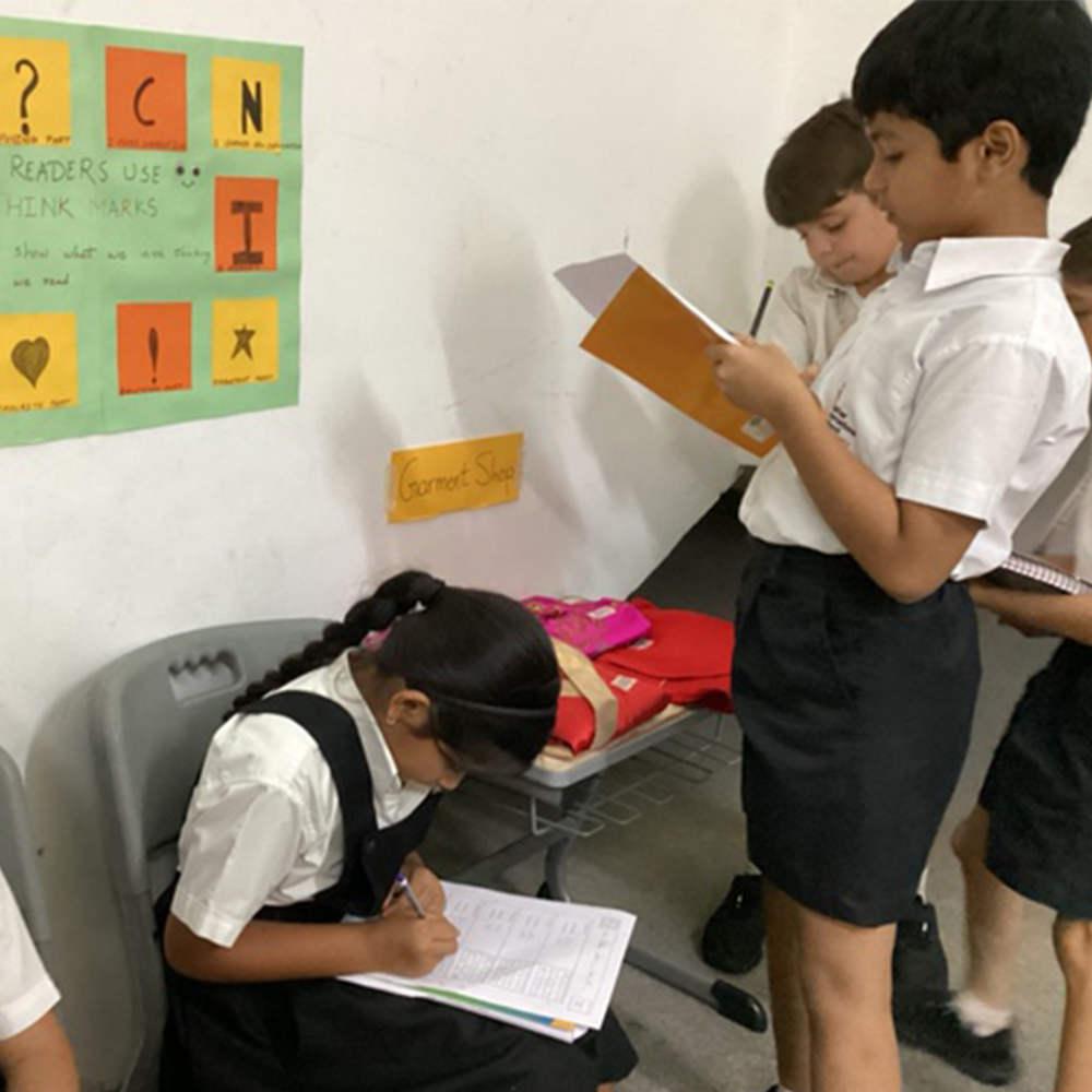 Students presenting their math projects at the event