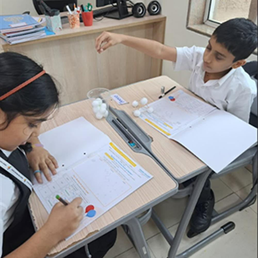 Children exploring scientific concepts hands-on